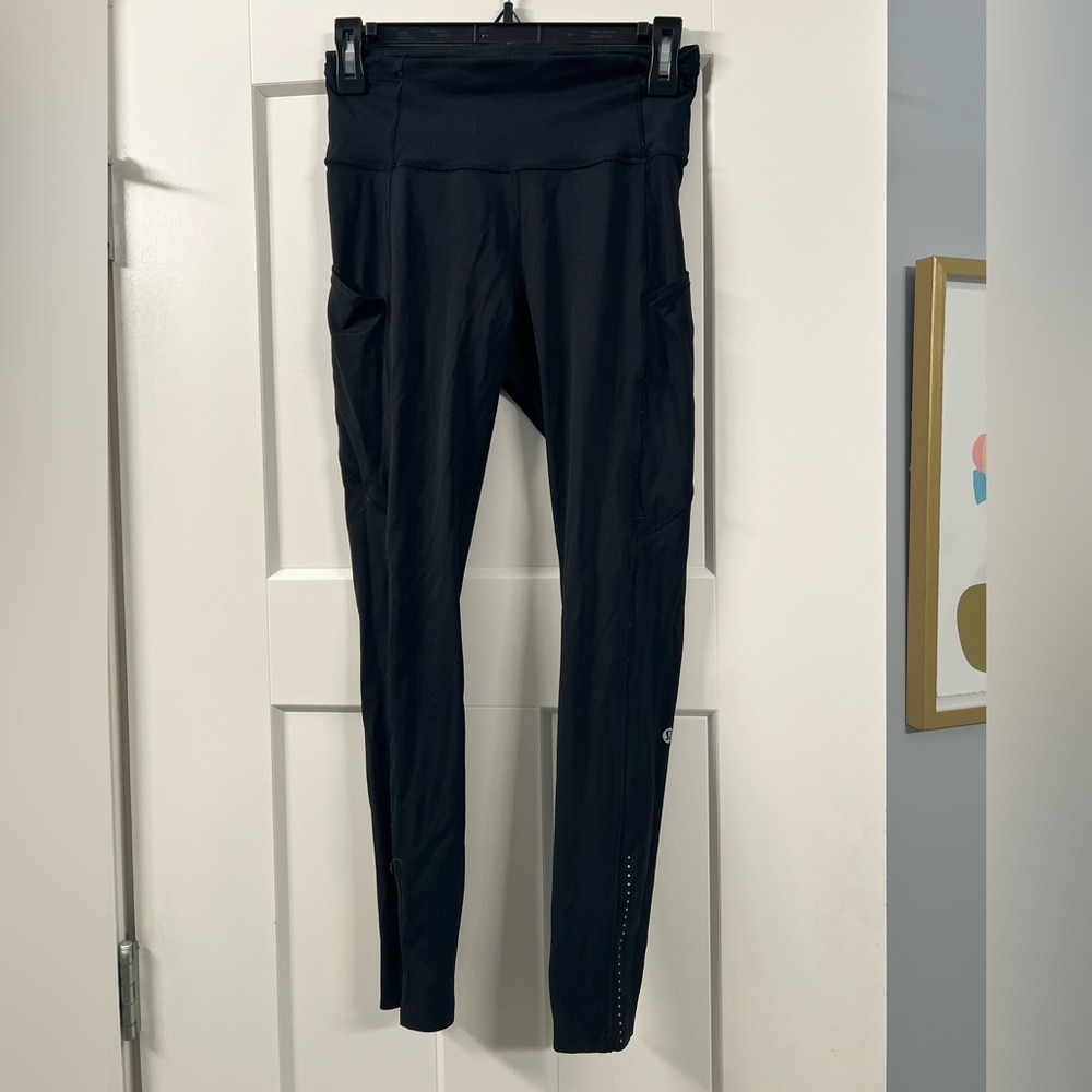 Black thin leggings with side pockets